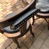 Pair of antique brown swivel armchairs in upholstery fabric, wooden frame, Hungary circa 1900.