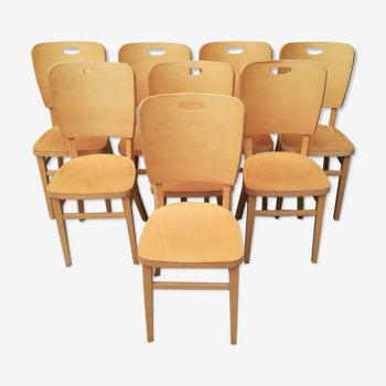 Suite de 8 chaises de bistrot à haut dossier années 70