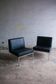 Set of 2 minimalist black leather lounge chairs