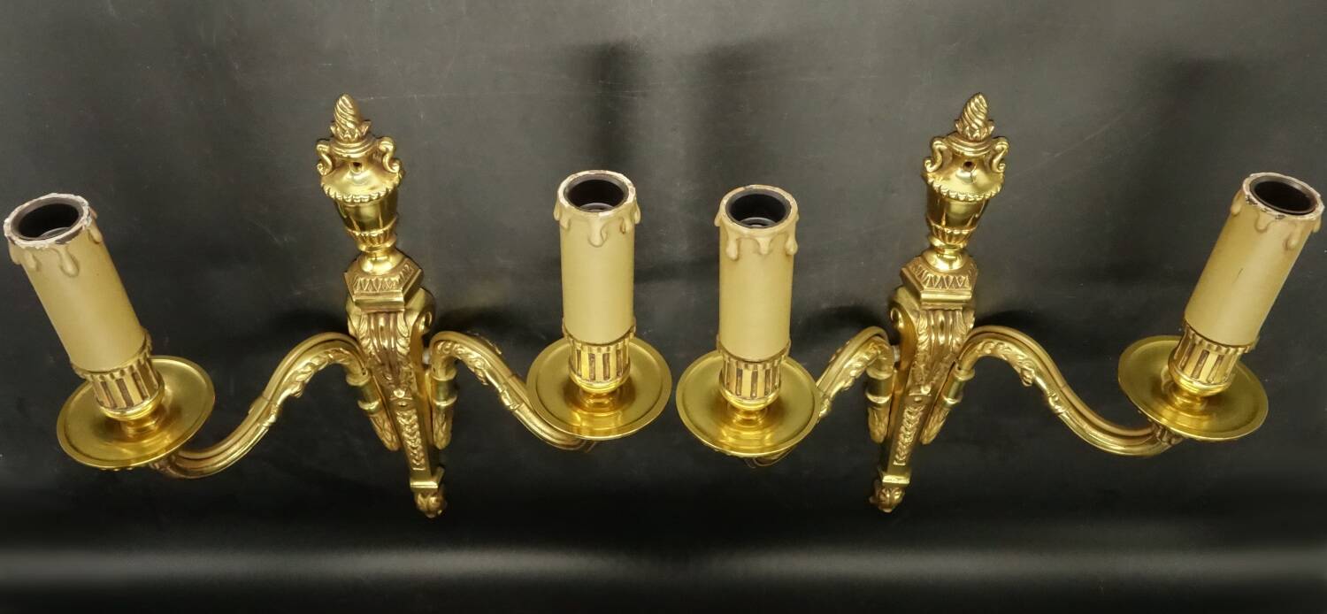 Pair of Louis XVI style urn and torch wall lights - gilt bronze