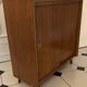 Vintage shoe cabinet with tapered legs