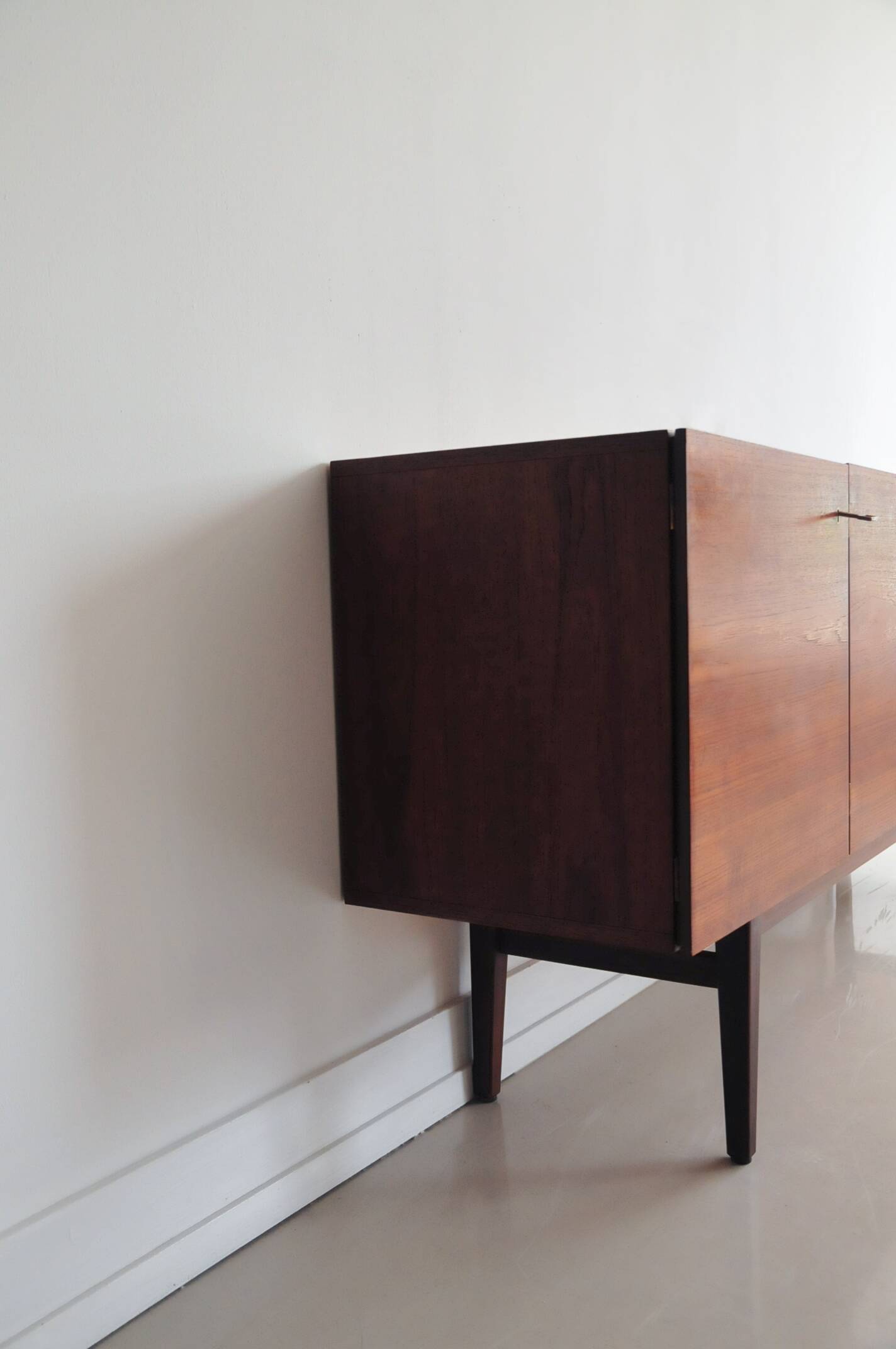 vintage Danish sideboard with black and white drawers