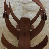 Unique piece of a magazine rack or log rack in solid oak pegged with leather handle