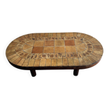 Roger Capron brown-ochre ceramic tile coffee table with wooden base, oval leaf-motif top