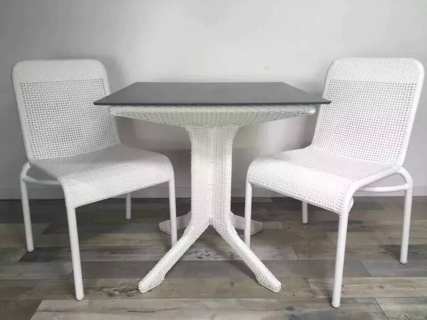 White woven resin garden chair