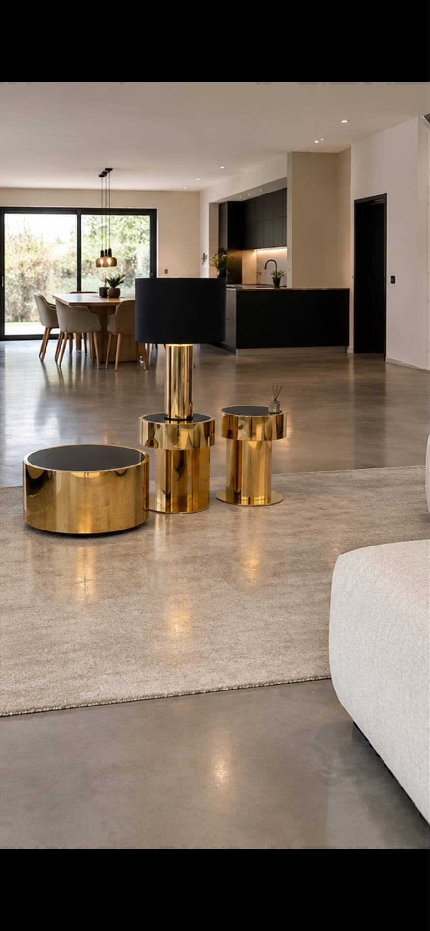2 bedside tables and a brass Fendi table.