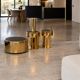 2 bedside tables and a brass Fendi table.