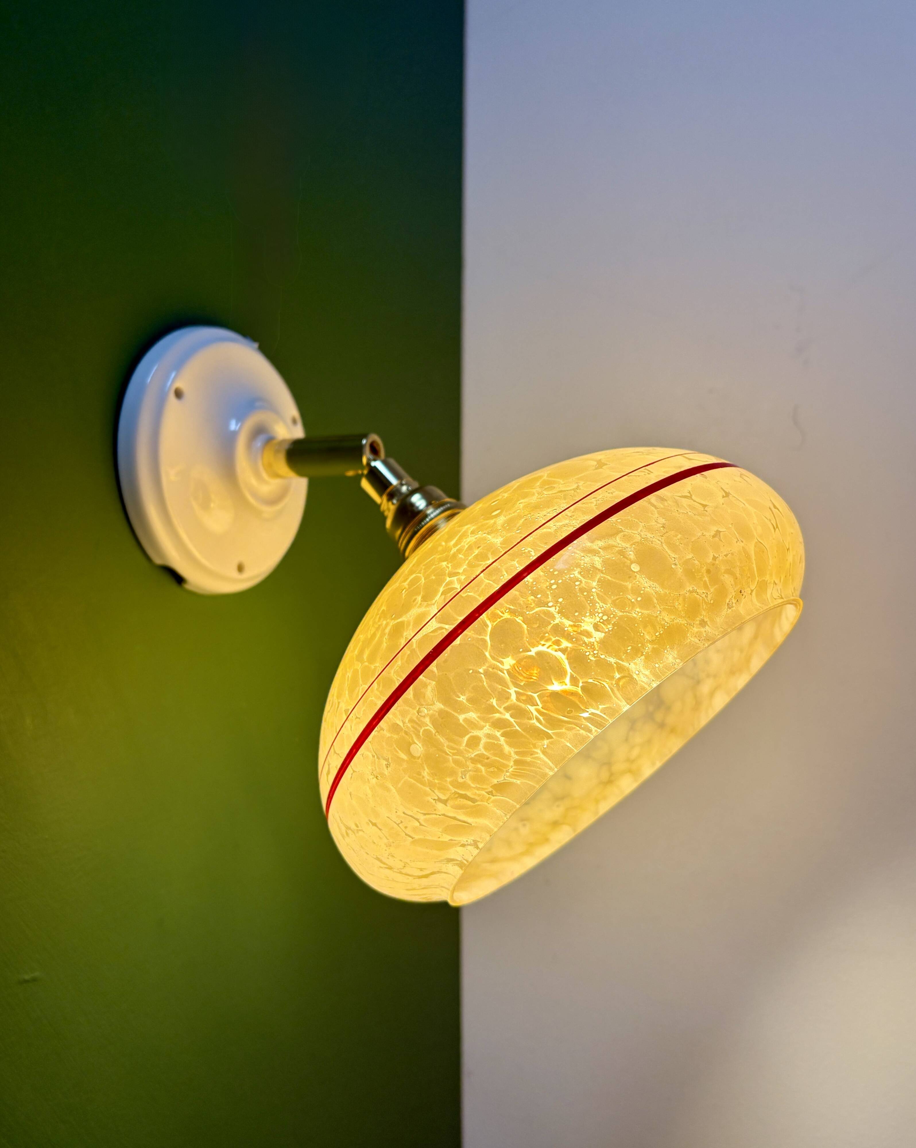 Vintage wall lamp with yellow clichy glass shade and red trim