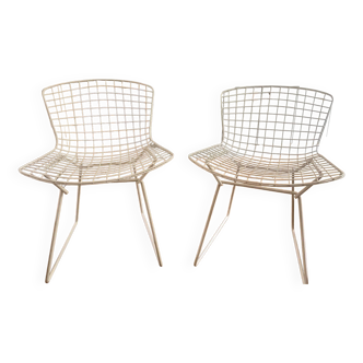 2 white Bertoia chairs