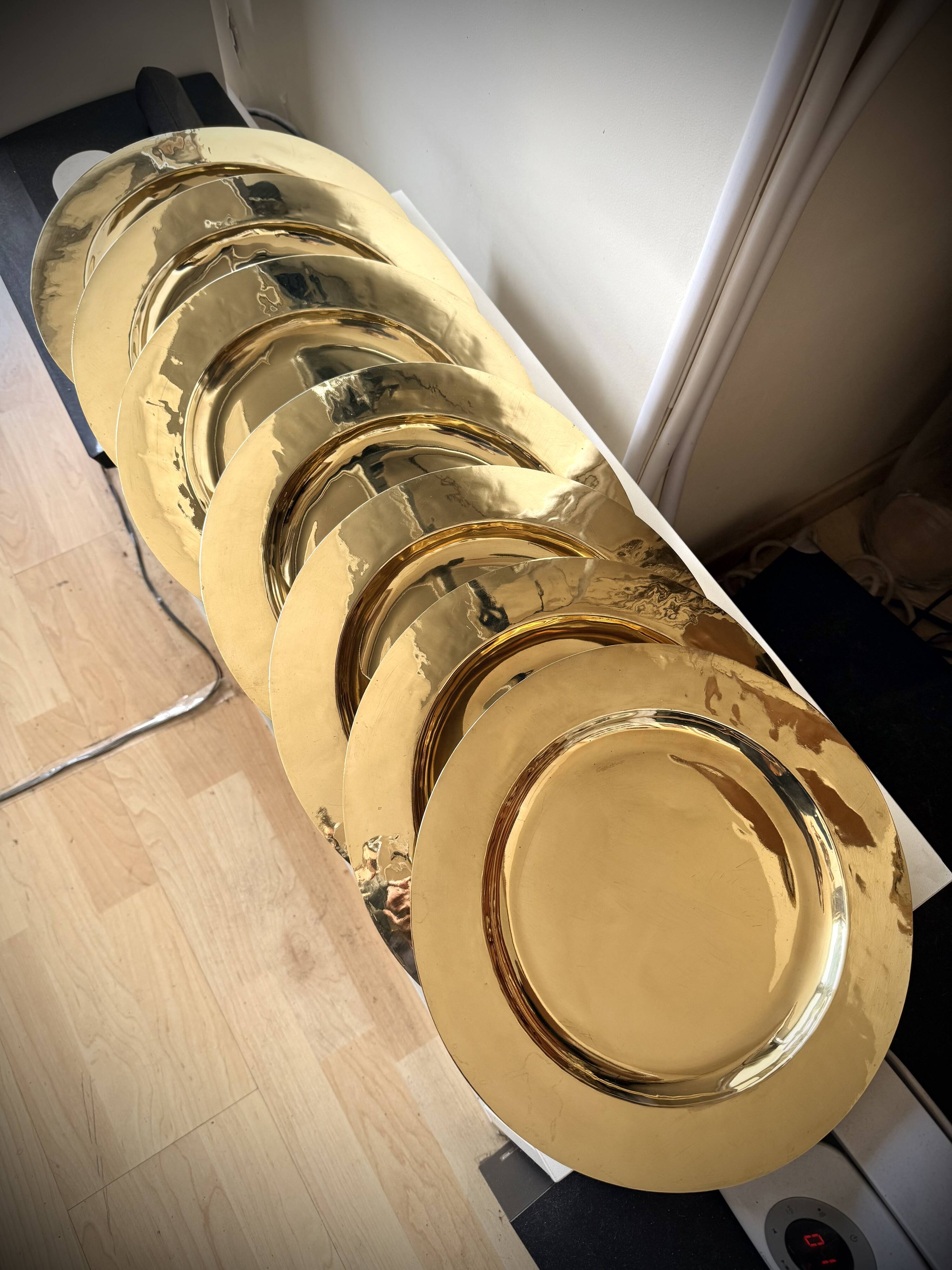 8 large dessert plates in brass