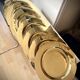 8 large dessert plates in brass