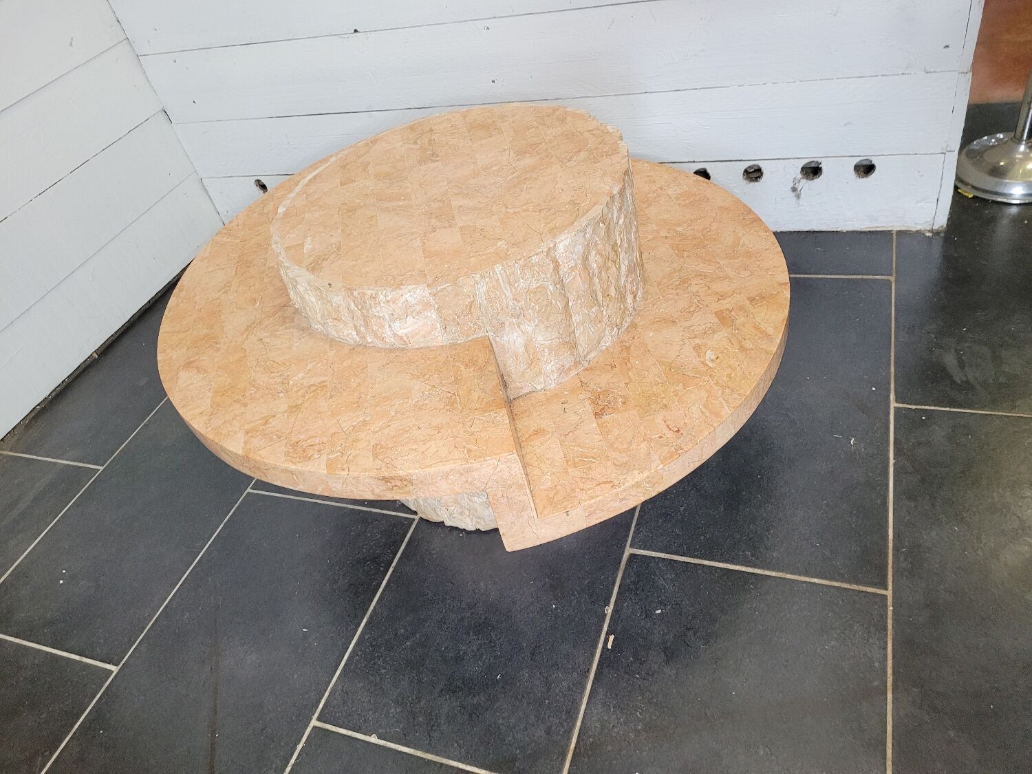 Round stone coffee table by Magnussen Ponte