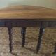 Beautiful antique half-moon table in walnut with its 4 extensions.