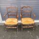 Pair of blackened wood armchairs