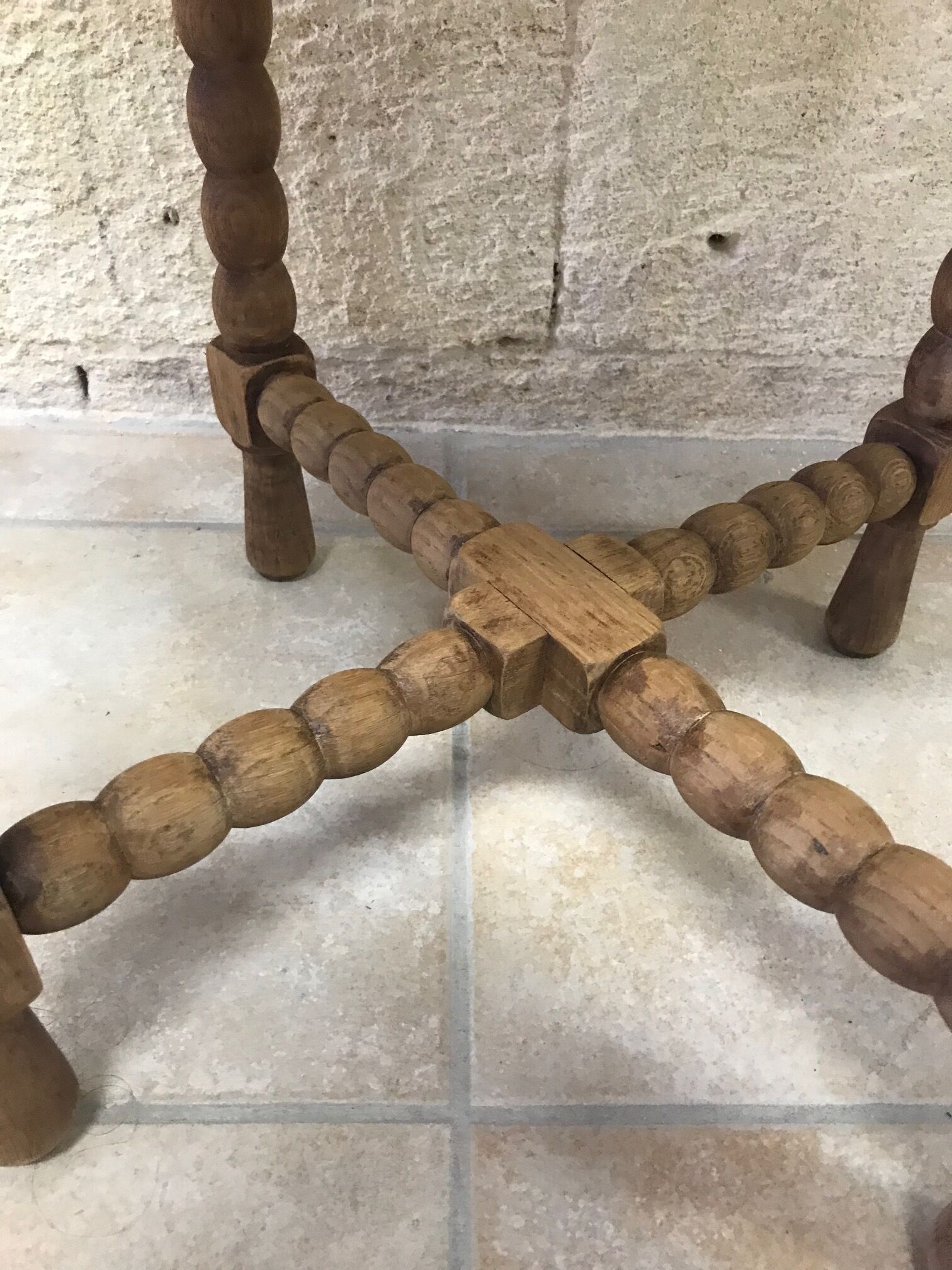 Round wooden side table