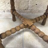 Round wooden side table