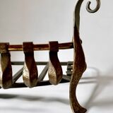 Old cast iron and brass log holder