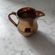 Gilt porcelain creamer