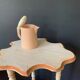 Sellette 1900 en bois découpé peint en blanc