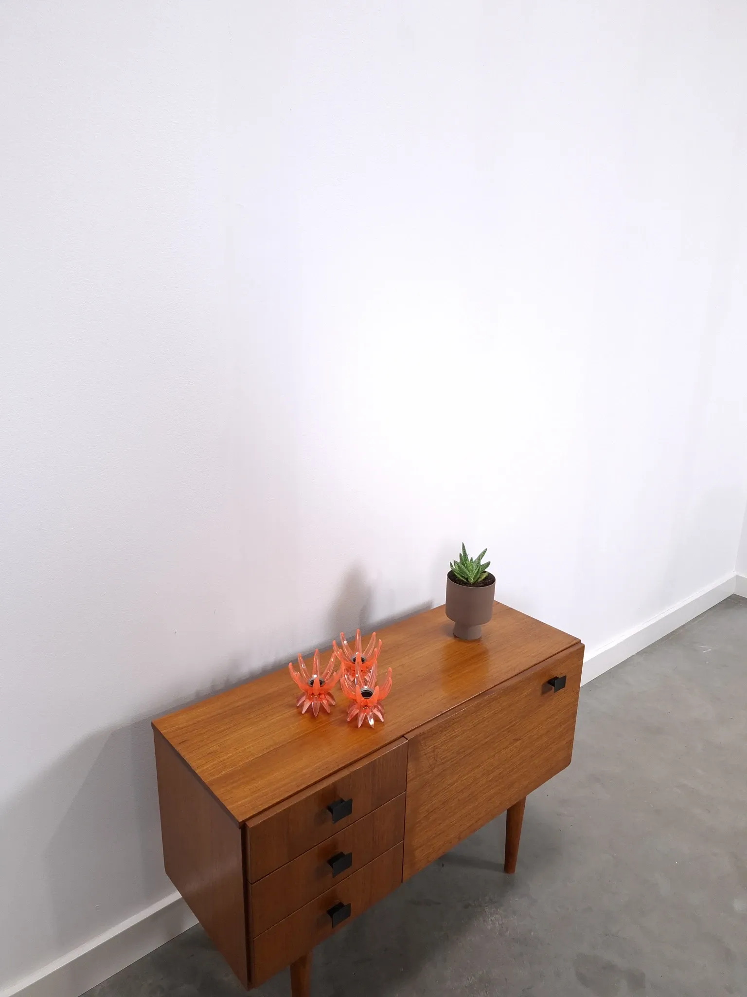 Vintage small teak cabinet with drawers, flap and black handles, hallway cabinet.