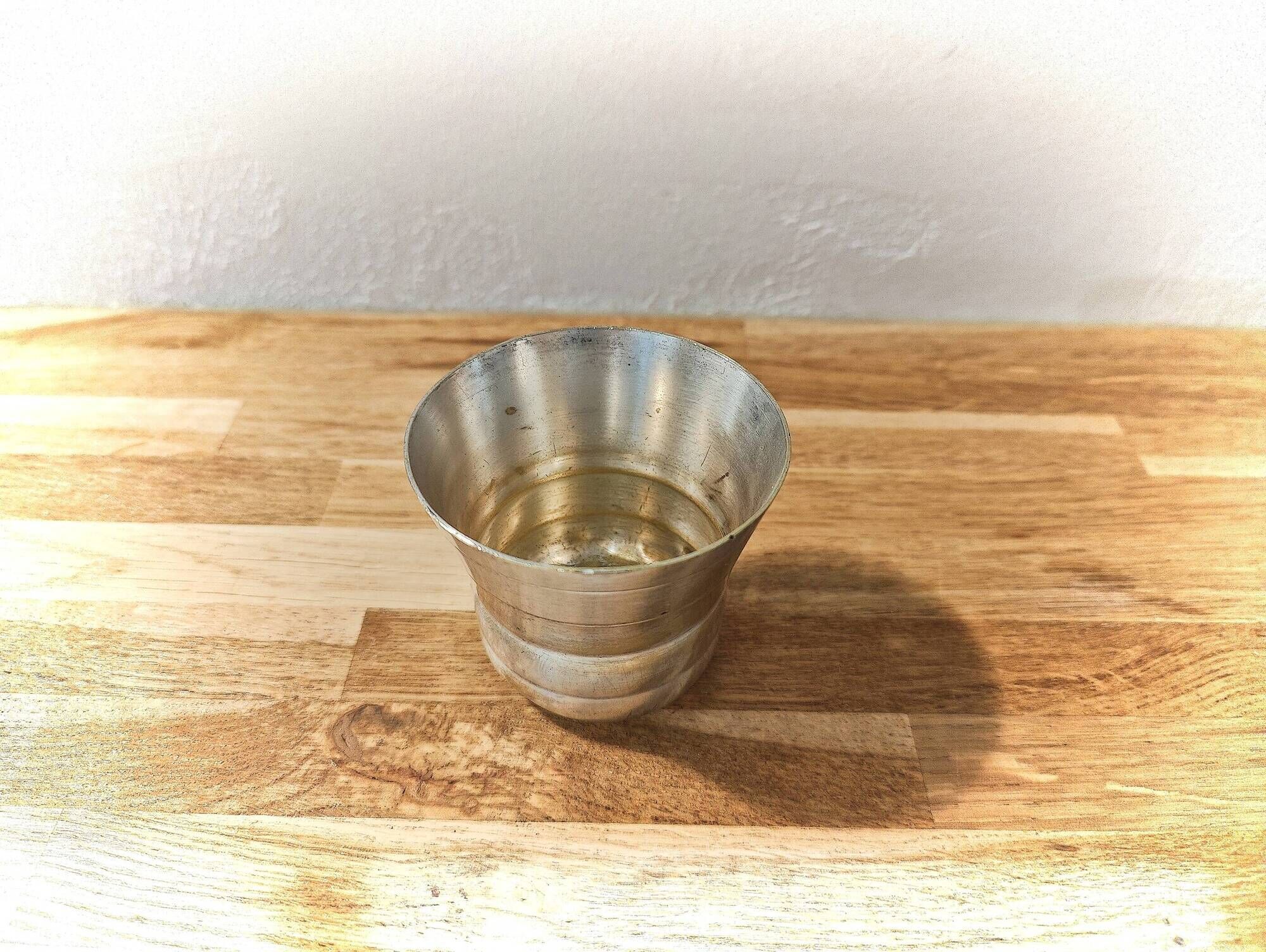 Antique timbale in silvered metal