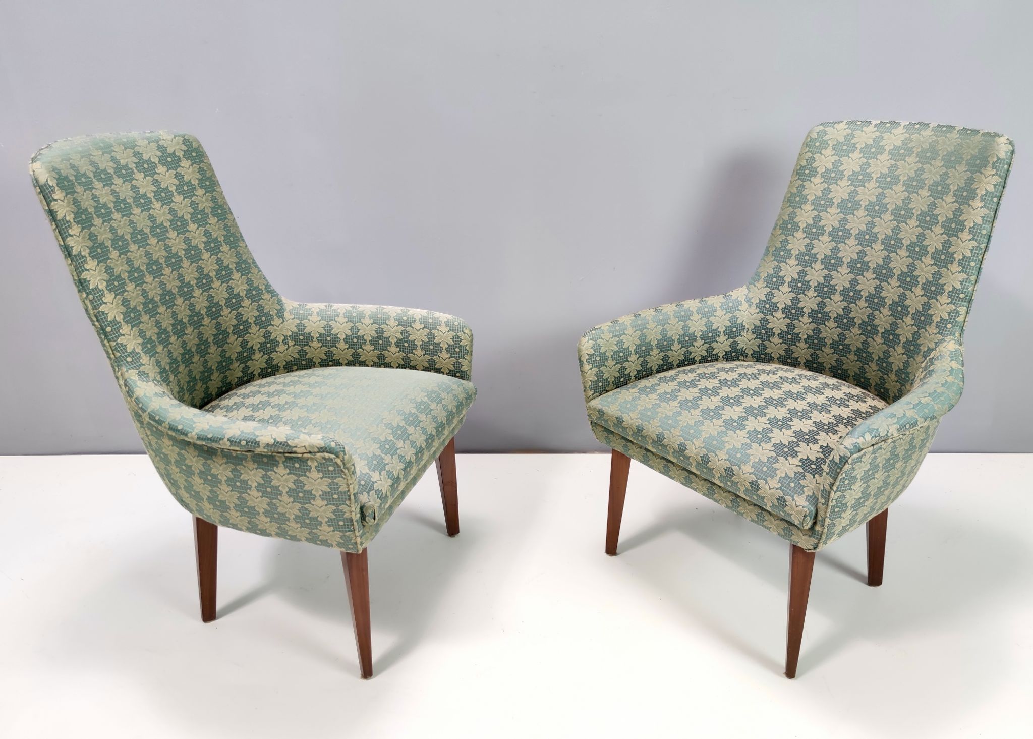 Green fabric and beech armchairs, italy