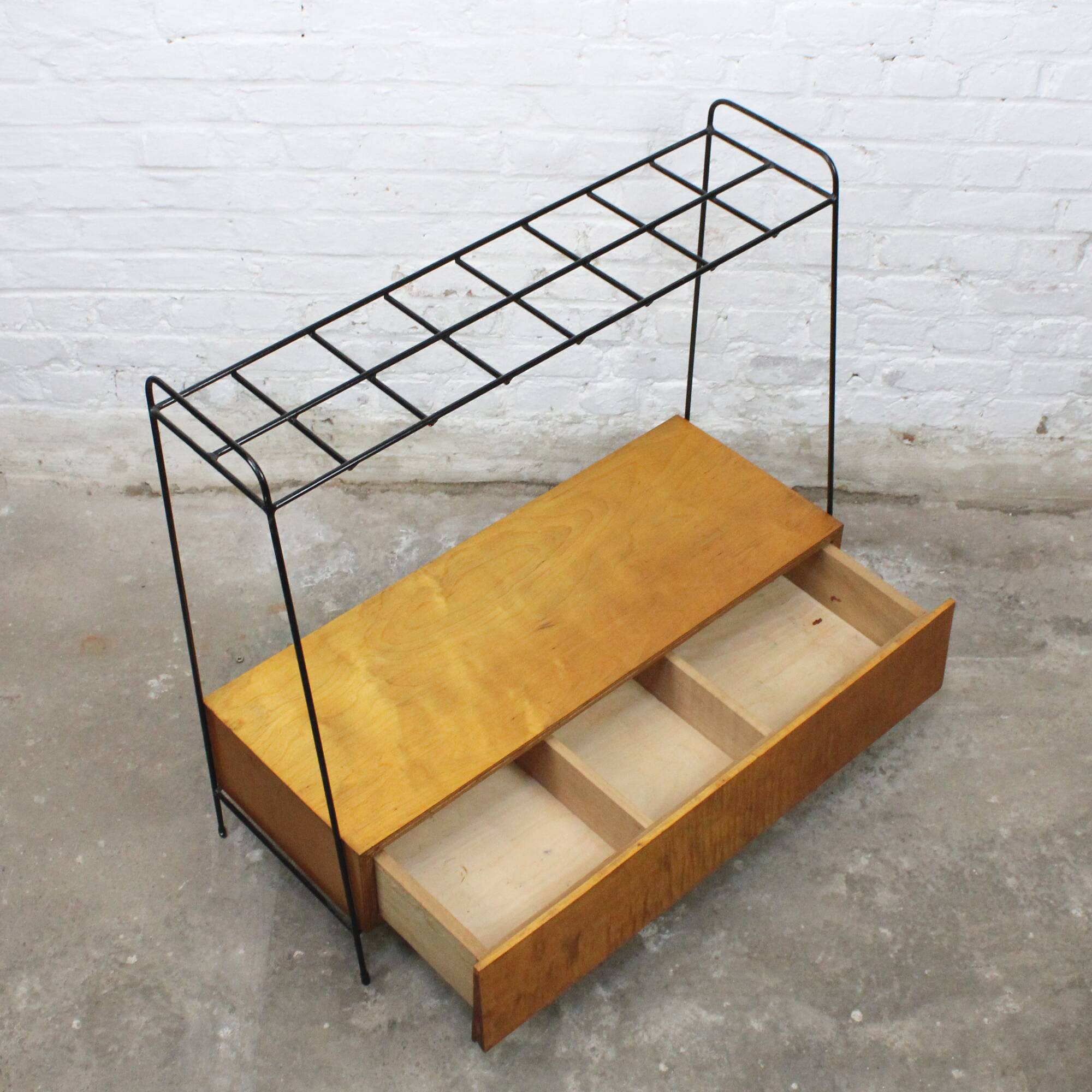 Vintage wood and lacquered metal storage unit.