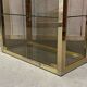 Pair of display cases in gilded chrome and smoked glass - 1980s