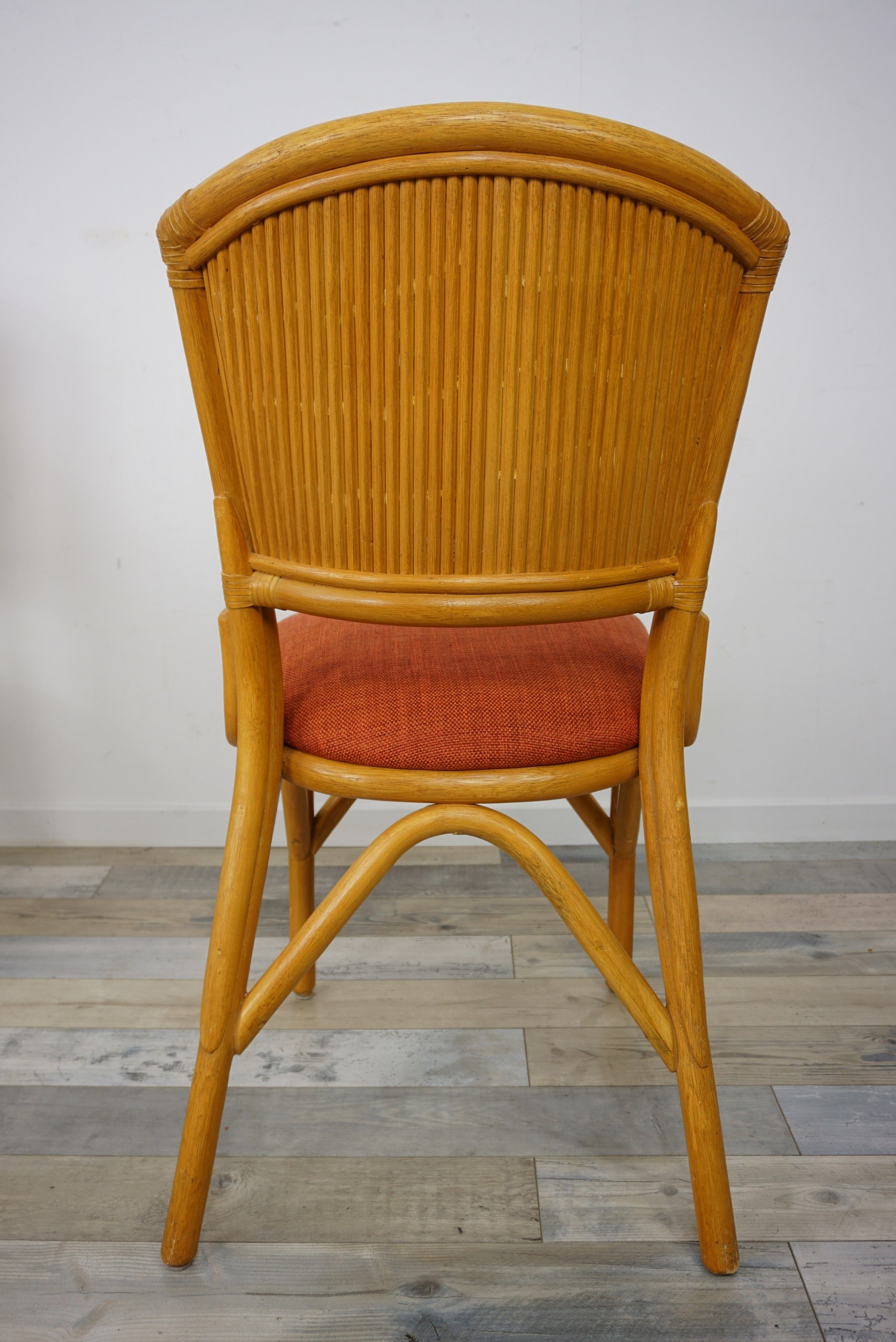 Suite of 4 chairs in Italian rattan design from the 60/70