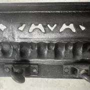 19th-century cast iron fireplace set, bar, andirons & plaque with griffins