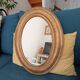 Louis Philippe 19th century oval gilded mirror in wood and stucco