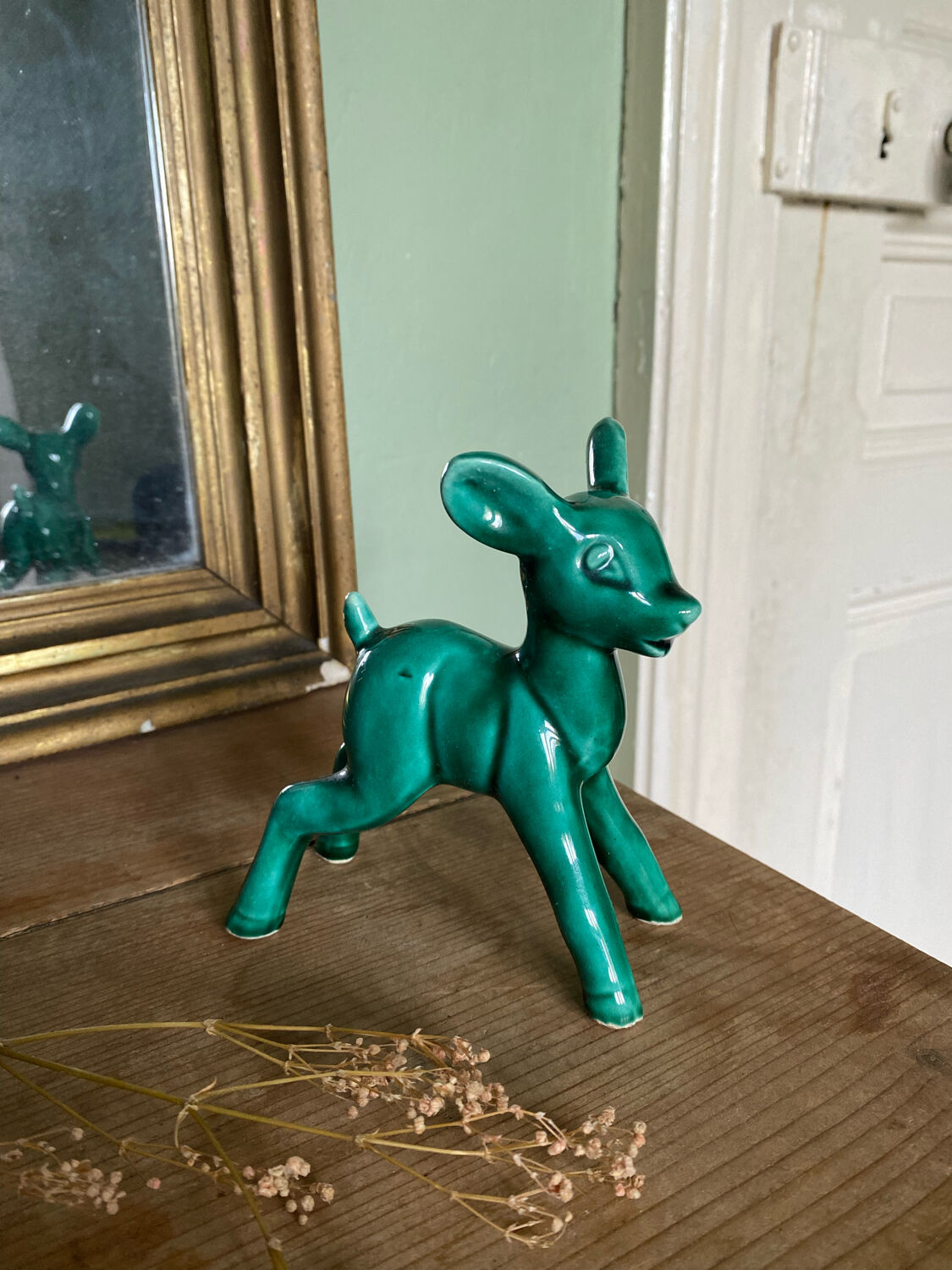 Art Nouveau green glazed ceramic fawn
