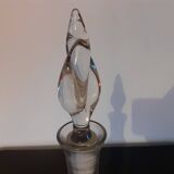 Carafe in chiseled glass and flame-shaped stopper