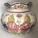 Round earthenware vase with polychrome floral motifs, signed