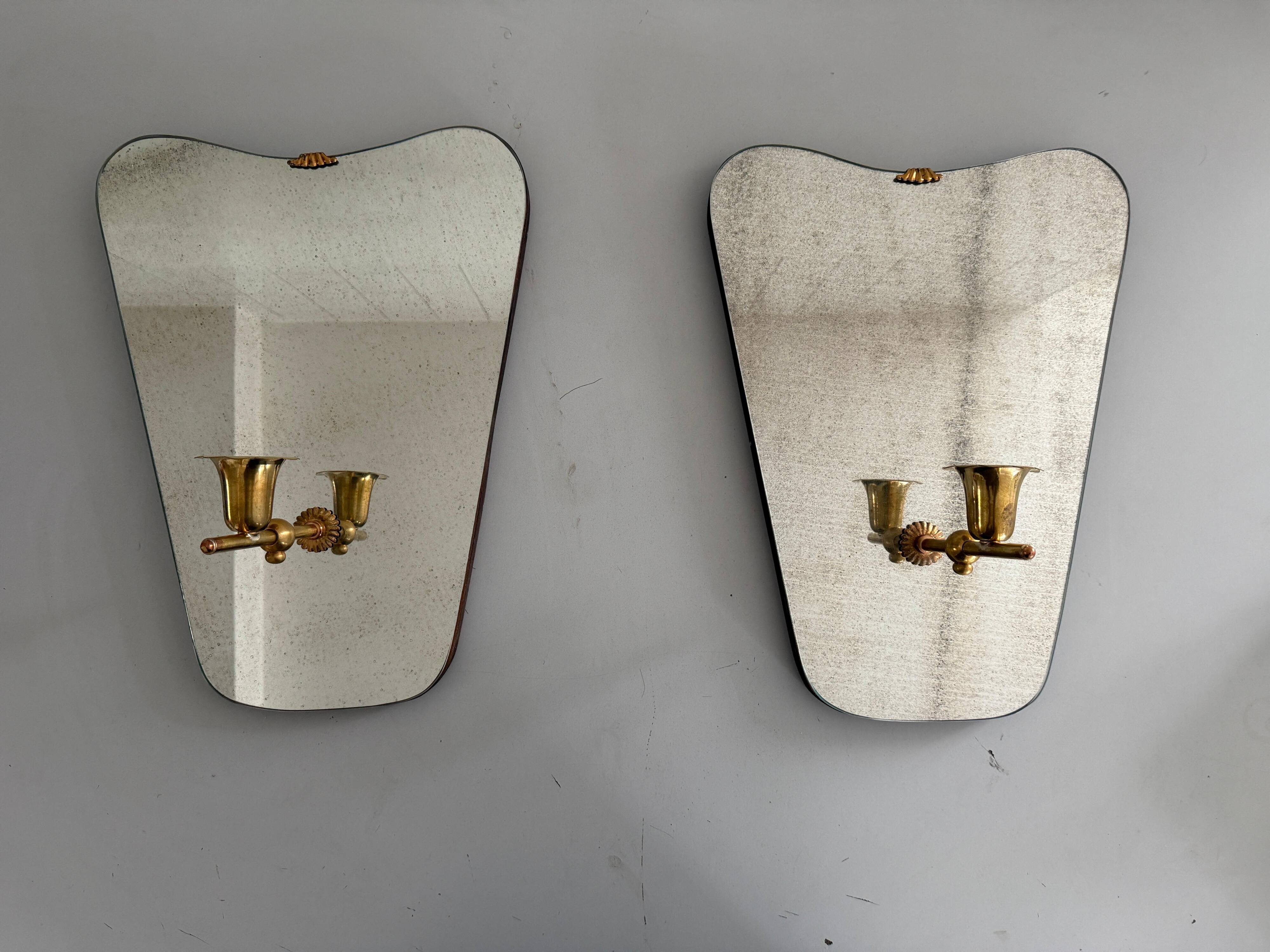 Pair of brass wall lights with mirrors, mid-20th century, Italy, 1960.