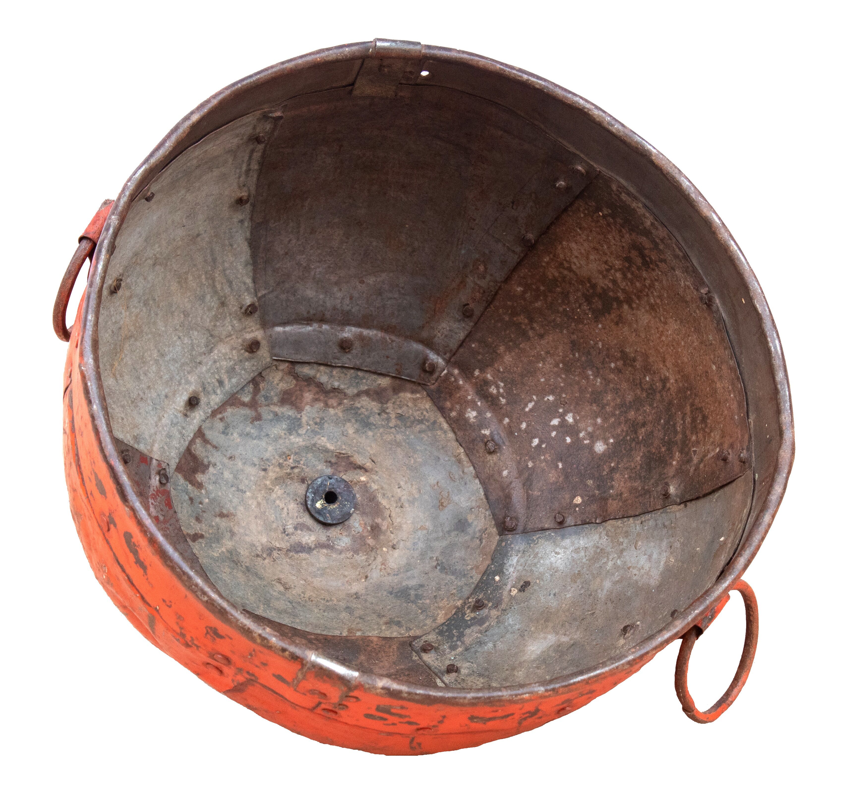 Metal hanging with its original red colour