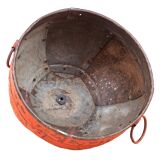 Metal hanging with its original red colour