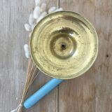 Chiseled brass candle holder