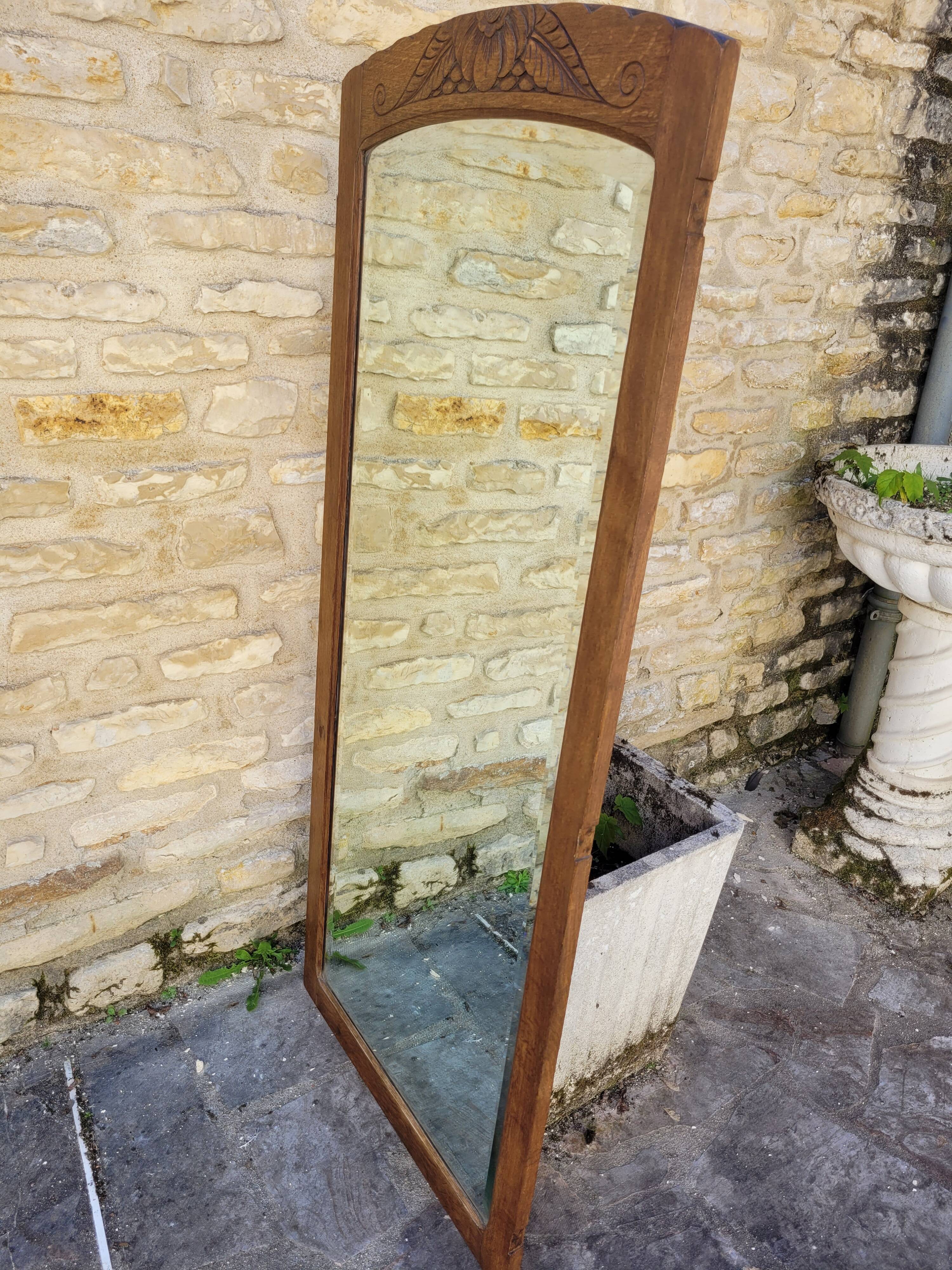 Art Deco oak mirror with bevelled glass from the 1930s.