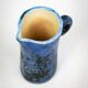 Small jug by Jacques Blin in blue ceramic with engraved animal decoration.