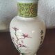 Japanese porcelain vase decorated with 2 geishas and flowering trees