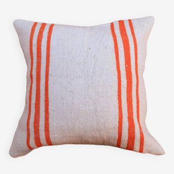 Coussin rayé orange et blanc en laine fait-main