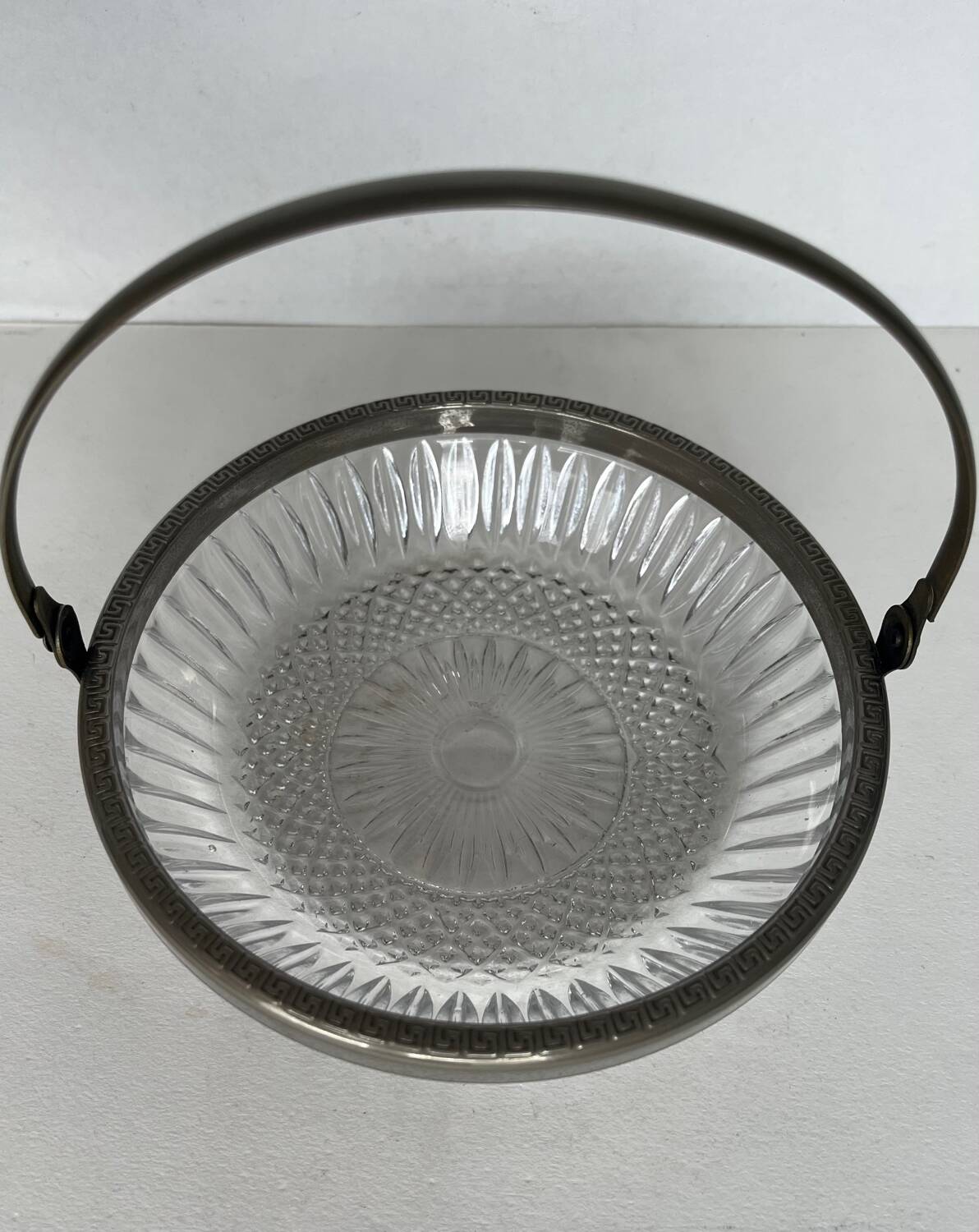 Antique glass cup with metal frame