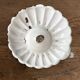 Antique enamelled sheet metal candle holder