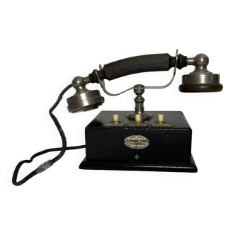 Ancien téléphone de bureau en bois noirci et bakélite vers 1900