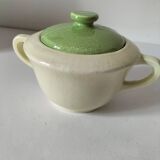 Two sugar bowls and a textured plate in turquoise and green Salins earthenware.