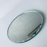 Old round beveled mirror
