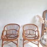 Pair of vintage rattan armchairs circa the 1970s.