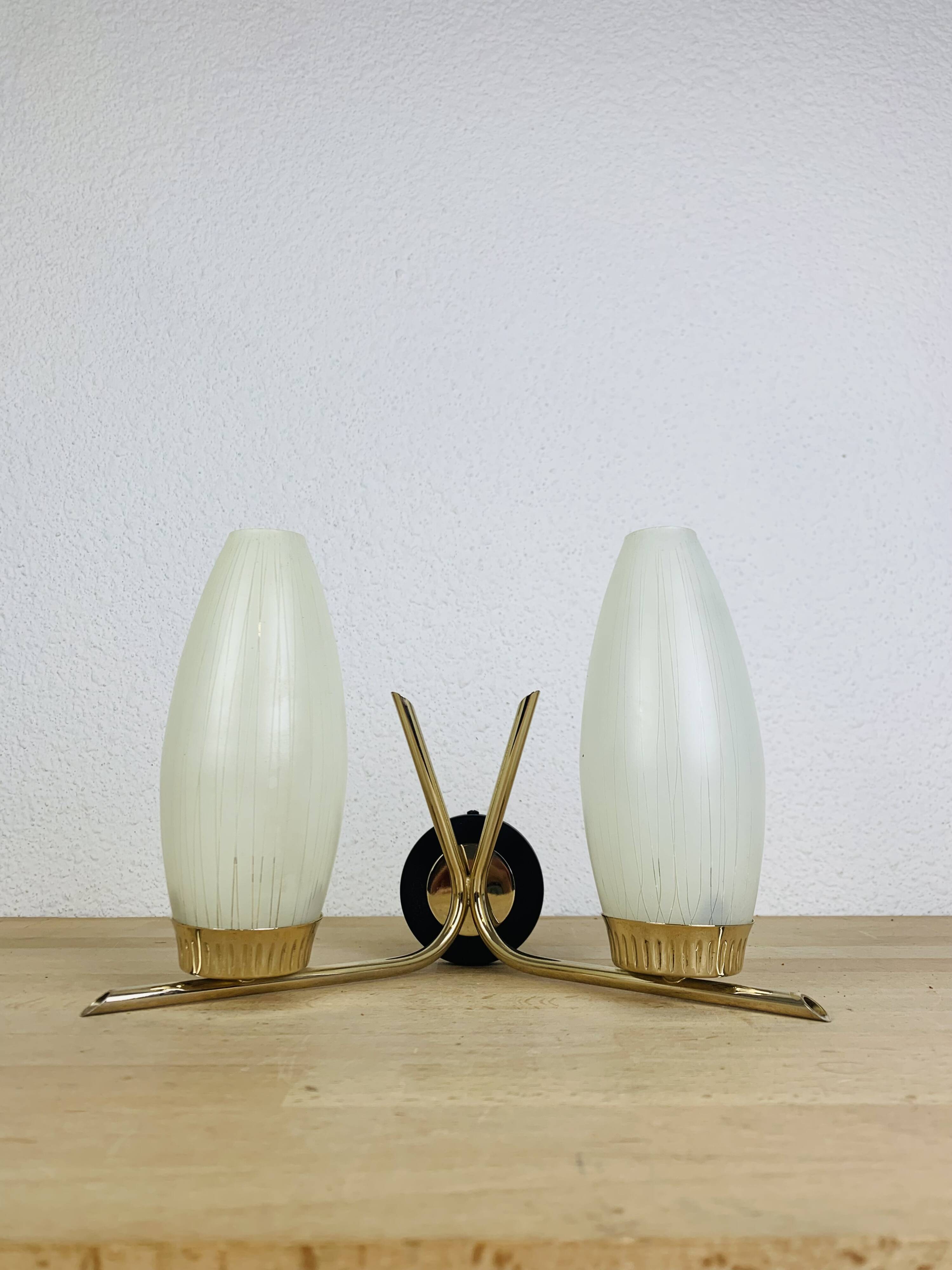 50s double-light wall light, brass and black metal, opaline tulips