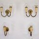 Set of four Mid-Century sconces in lacquer and brass. Italy 1950s